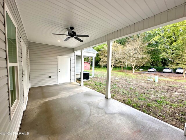 view of patio / terrace featuring ceiling fan and central AC unit