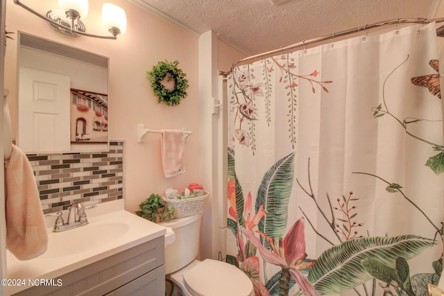 bathroom featuring a textured ceiling, a shower with shower curtain, toilet, vanity, and decorative backsplash