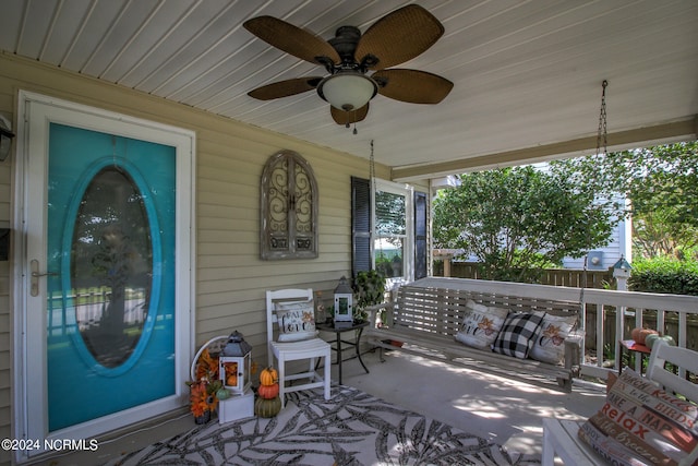 view of patio featuring ceiling fan