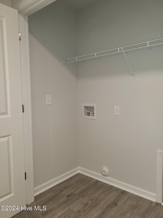 washroom with washer hookup and dark hardwood / wood-style floors