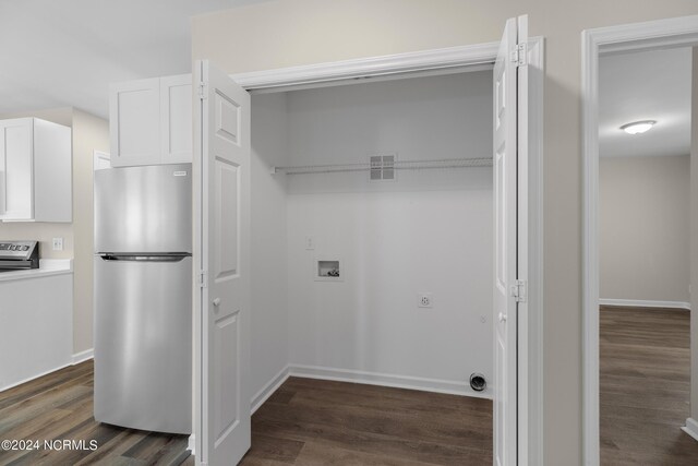 laundry room featuring hookup for a washing machine and dark hardwood / wood-style floors