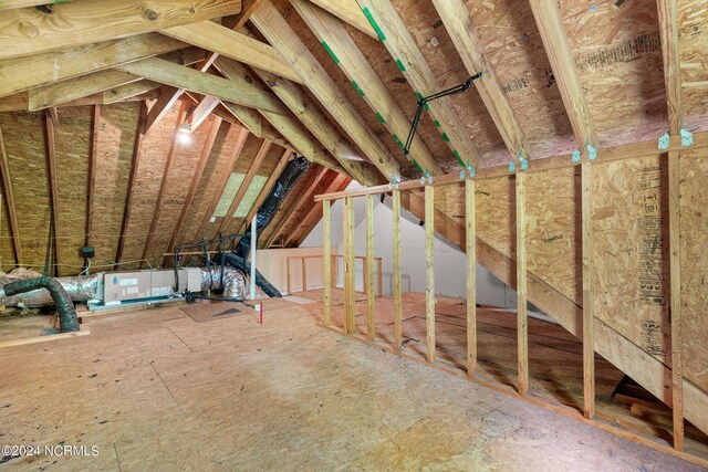 back of property featuring a garage, a yard, a patio area, and central air condition unit