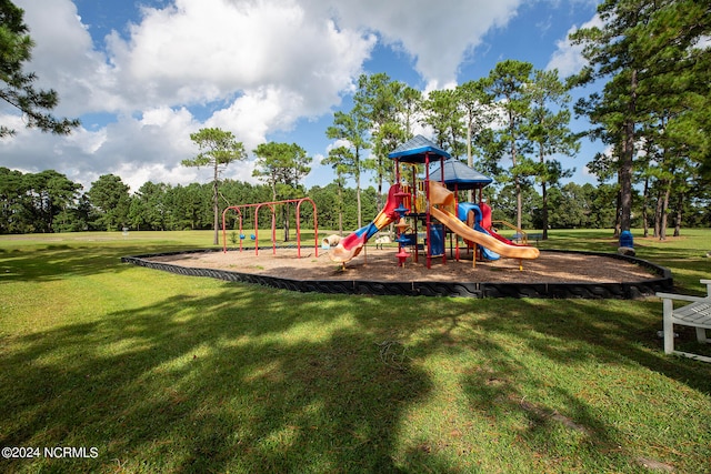 view of play area with a yard