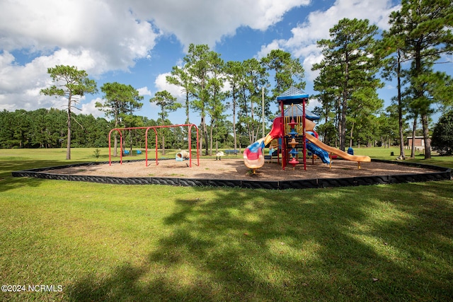 view of jungle gym with a lawn