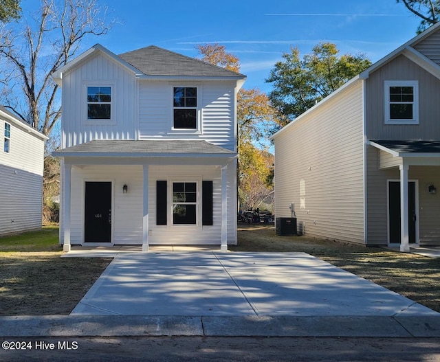 front of property featuring central AC unit and a porch