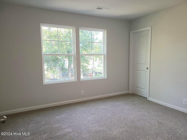 view of carpeted spare room