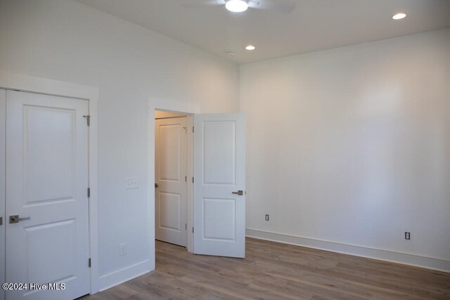 unfurnished bedroom with light hardwood / wood-style floors