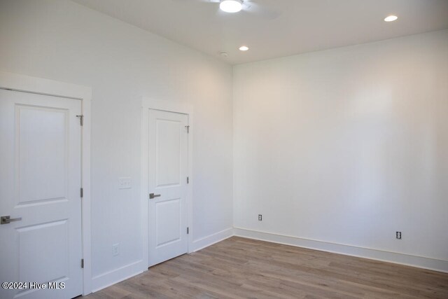 unfurnished room featuring light wood-type flooring