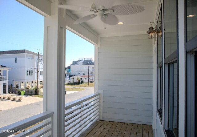 balcony featuring ceiling fan