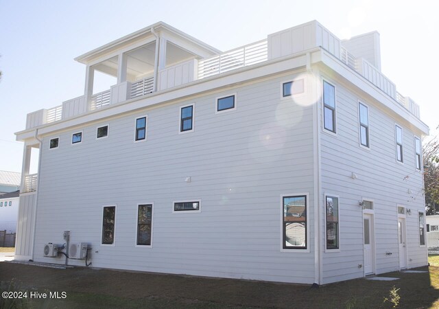 view of property exterior featuring a balcony