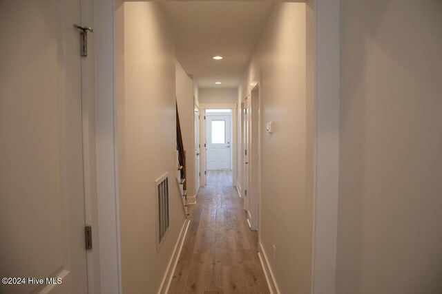 hallway featuring light hardwood / wood-style flooring