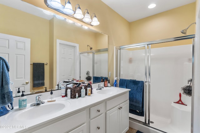 bathroom featuring vanity and walk in shower