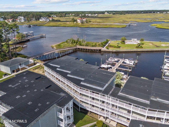 birds eye view of property featuring a water view