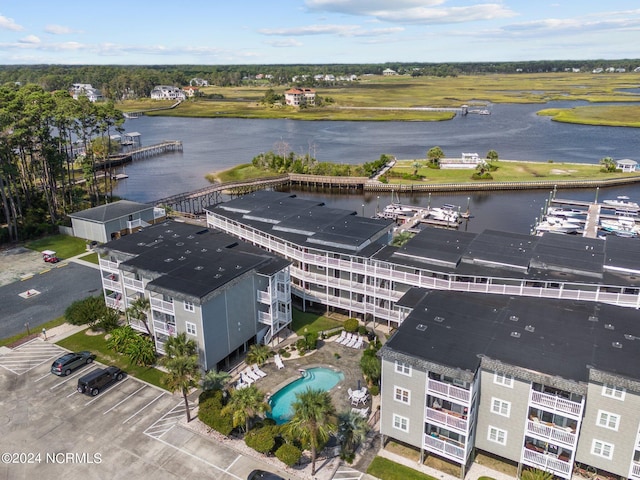 birds eye view of property featuring a water view