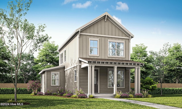 view of front of house with a front yard and covered porch