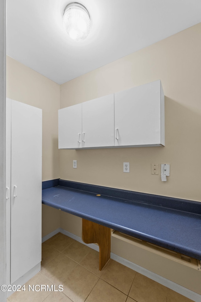 interior space featuring light tile patterned flooring