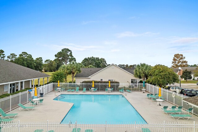 view of pool with a patio area