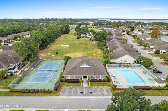 bird's eye view with a water view