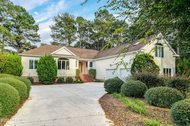 view of front of property featuring a garage