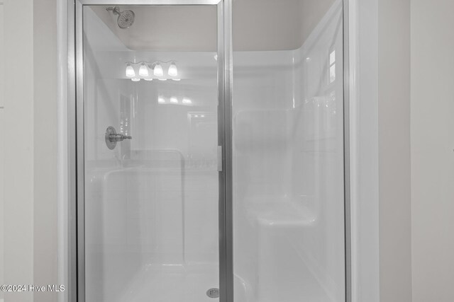 bathroom featuring walk in shower