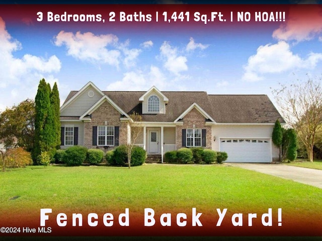 view of front of home featuring a front yard and a garage