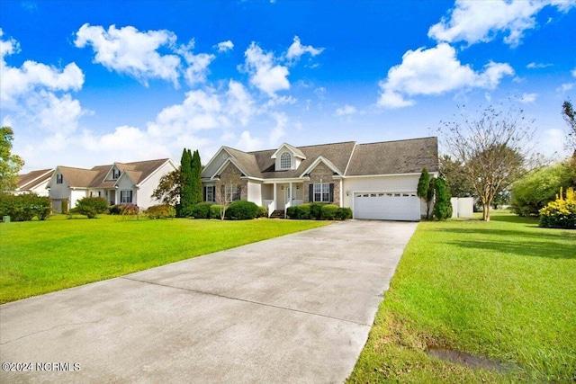 view of front facade with a garage and a front lawn