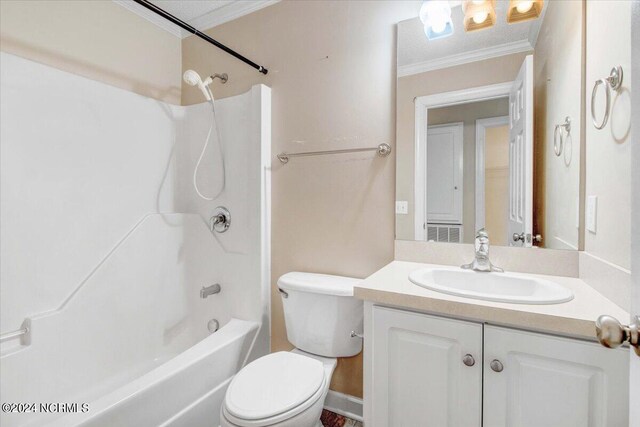 full bathroom featuring shower / bathing tub combination, vanity, toilet, and ornamental molding