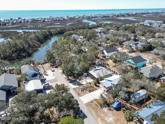 bird's eye view with a water view and a residential view