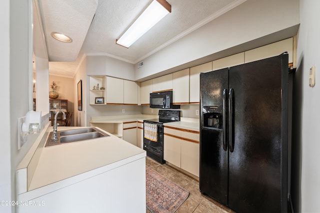 kitchen featuring open shelves, a sink, visible vents, light countertops, and black appliances