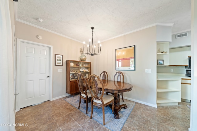 tiled dining room with a chandelier, visible vents, crown molding, and a textured ceiling