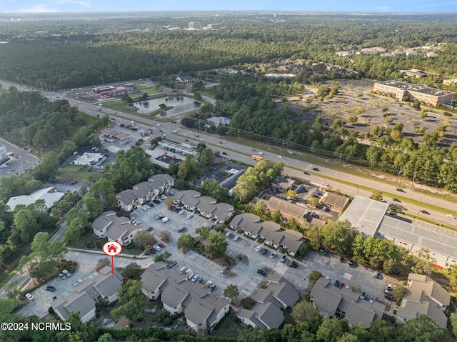 bird's eye view featuring a residential view and a view of trees