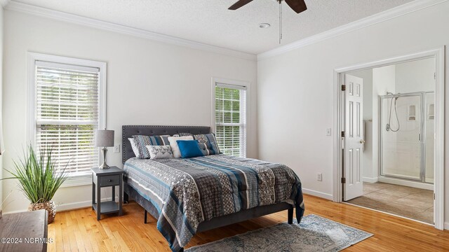 bedroom with ornamental molding, hardwood / wood-style floors, and ceiling fan