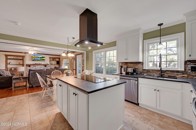 kitchen featuring island exhaust hood, a wealth of natural light, a center island, and dishwasher