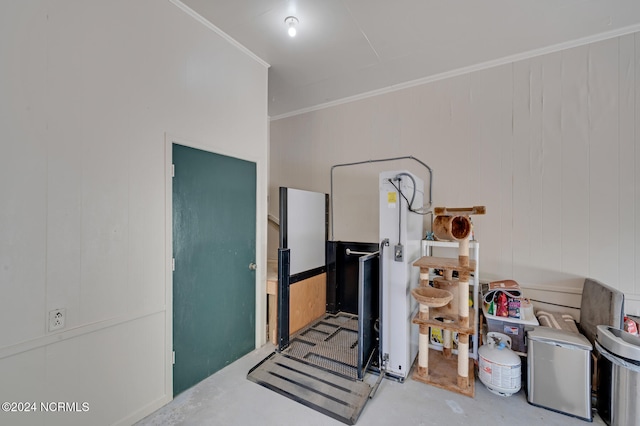 interior space with concrete flooring, wood walls, and ornamental molding