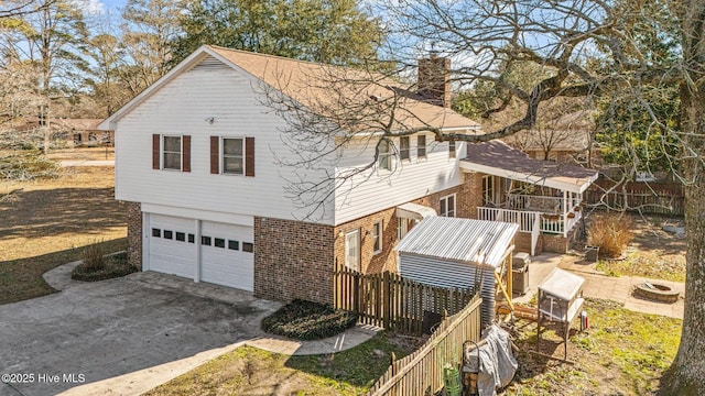 view of side of property featuring a garage