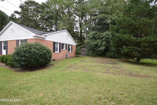 view of property exterior with a yard