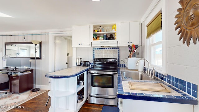 kitchen with dark wood-type flooring, sink, white cabinets, stainless steel electric range oven, and backsplash