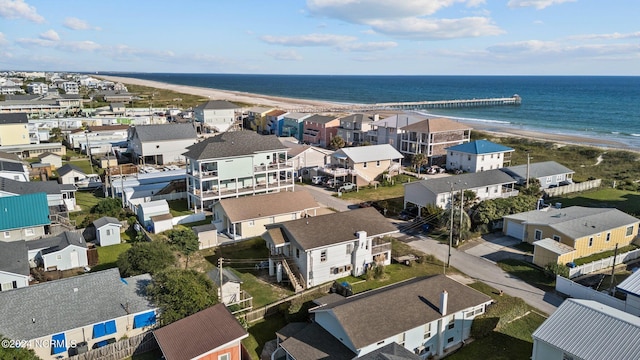 bird's eye view with a view of the beach and a water view