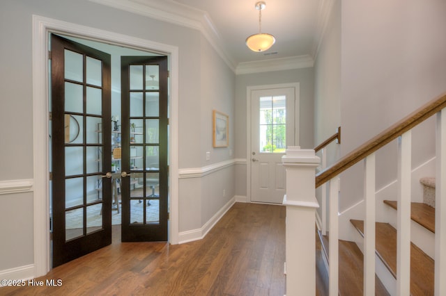 572 Hearthside Dr SE, Bolivia, NC 28422 - entryway featuring wood finished floors, crown molding, french doors, baseboards, and stairway