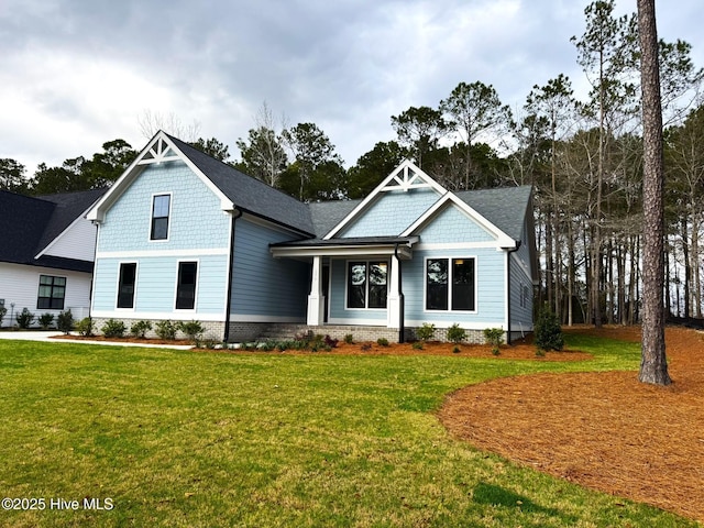 572 Hearthside Dr SE, Bolivia, NC 28422 - craftsman house with a front lawn