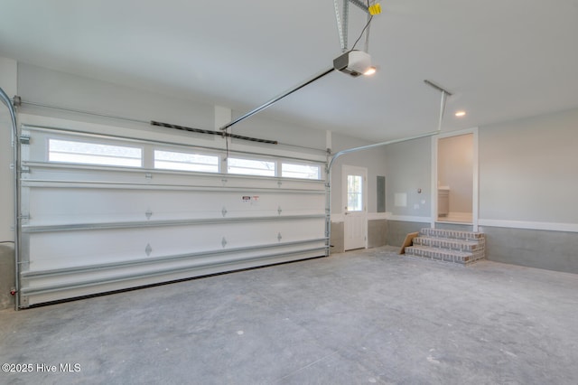 572 Hearthside Dr SE, Bolivia, NC 28422 - garage featuring a garage door opener