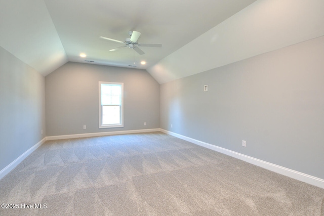 572 Hearthside Dr SE, Bolivia, NC 28422 - additional living space with vaulted ceiling, a ceiling fan, baseboards, and carpet flooring