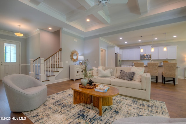 572 Hearthside Dr SE, Bolivia, NC 28422 - living room with crown molding, wood finished floors, stairs, beamed ceiling, and baseboards