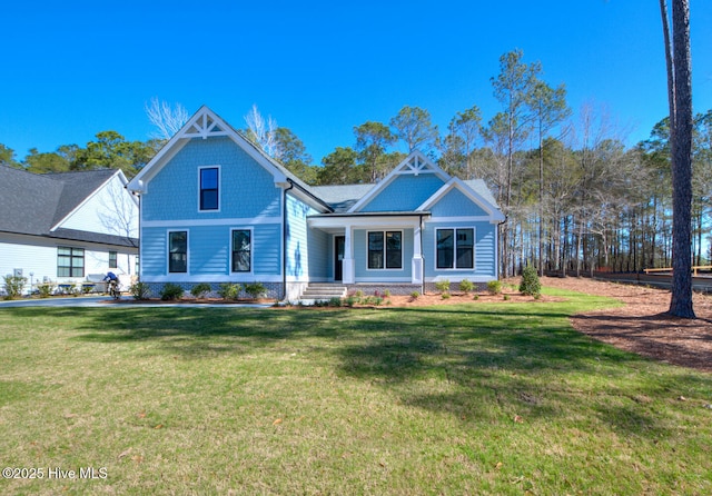 572 Hearthside Dr SE, Bolivia, NC 28422 - view of front of property with a front lawn and a porch