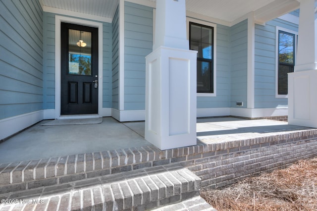 572 Hearthside Dr SE, Bolivia, NC 28422 - property entrance featuring covered porch