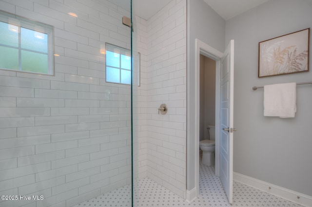 572 Hearthside Dr SE, Bolivia, NC 28422 - bathroom with plenty of natural light, walk in shower, toilet, and baseboards