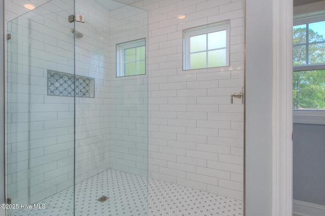572 Hearthside Dr SE, Bolivia, NC 28422 - full bath featuring tiled shower and plenty of natural light