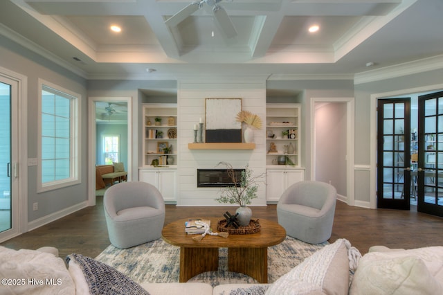 572 Hearthside Dr SE, Bolivia, NC 28422 - living room with a ceiling fan, french doors, wood finished floors, a glass covered fireplace, and ornamental molding