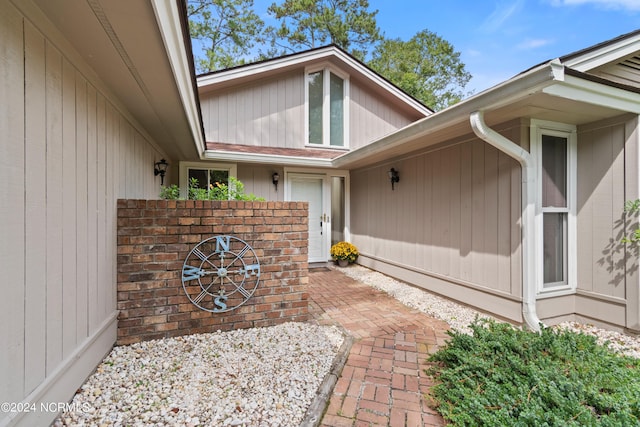 property entrance with a patio area