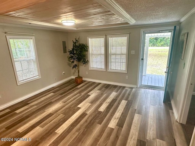 interior space with wood-type flooring and crown molding